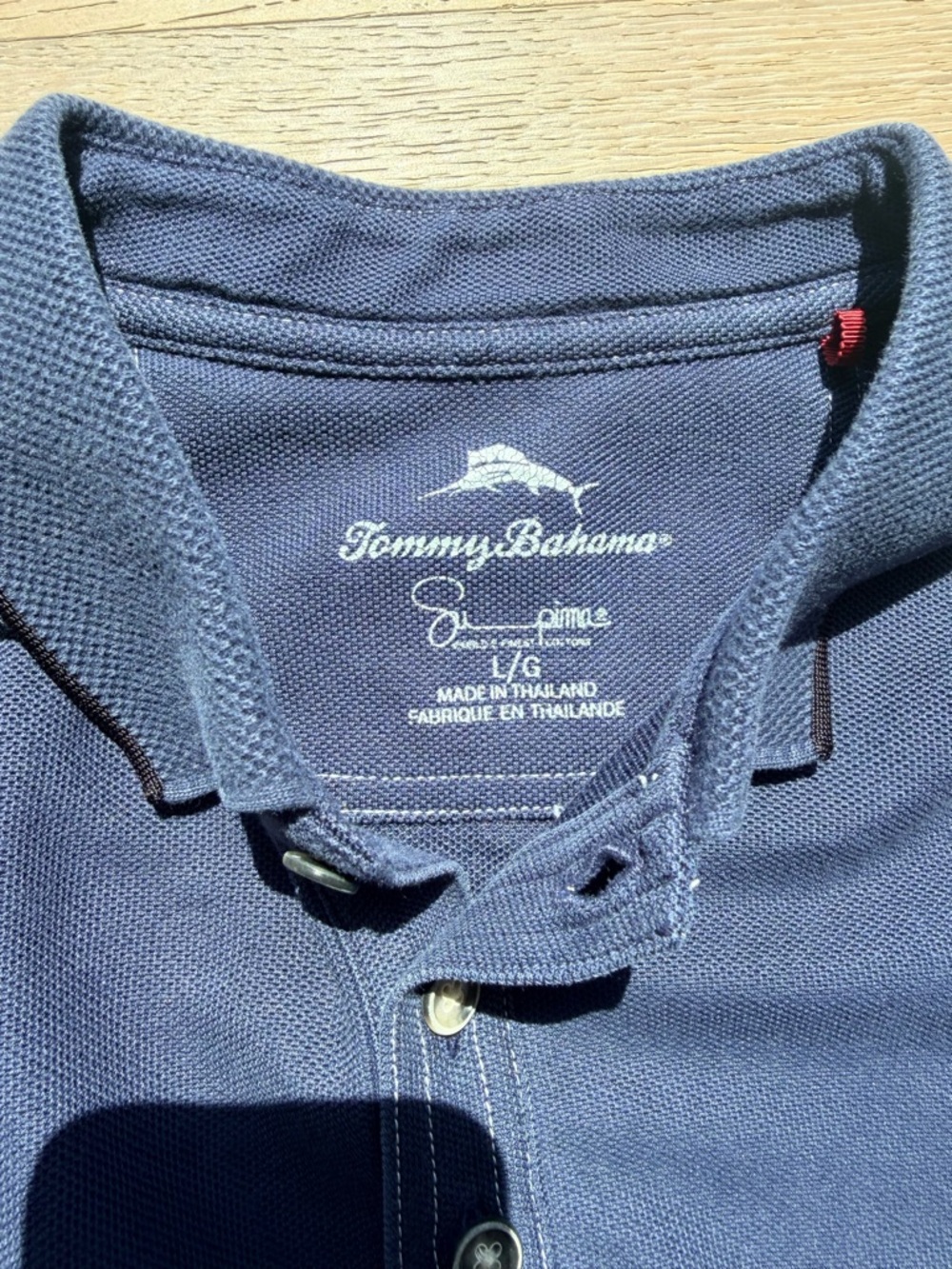 Tommy Bahama Blue Polo Shirt with Subtle Dark Trim - Picture 2 of 7